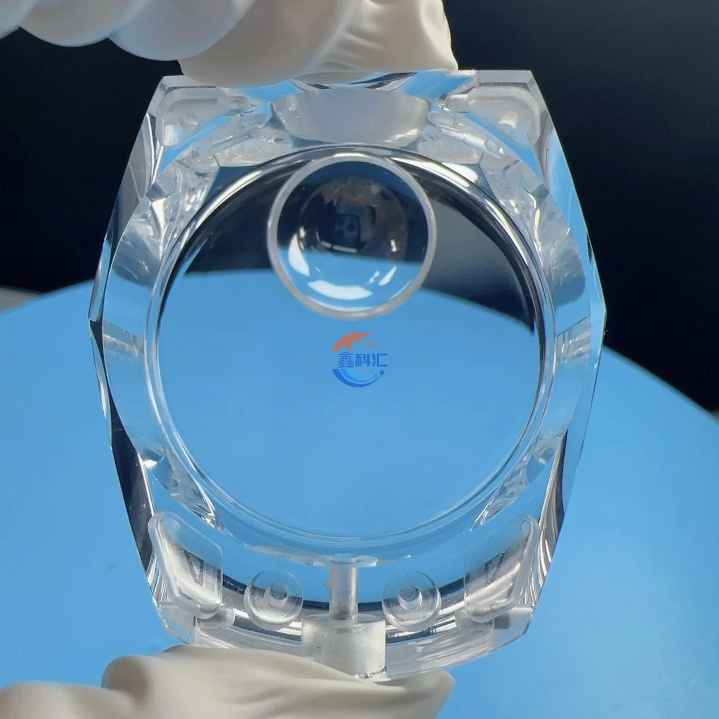 Transparent sapphire case showing its polished contours and internal clearance